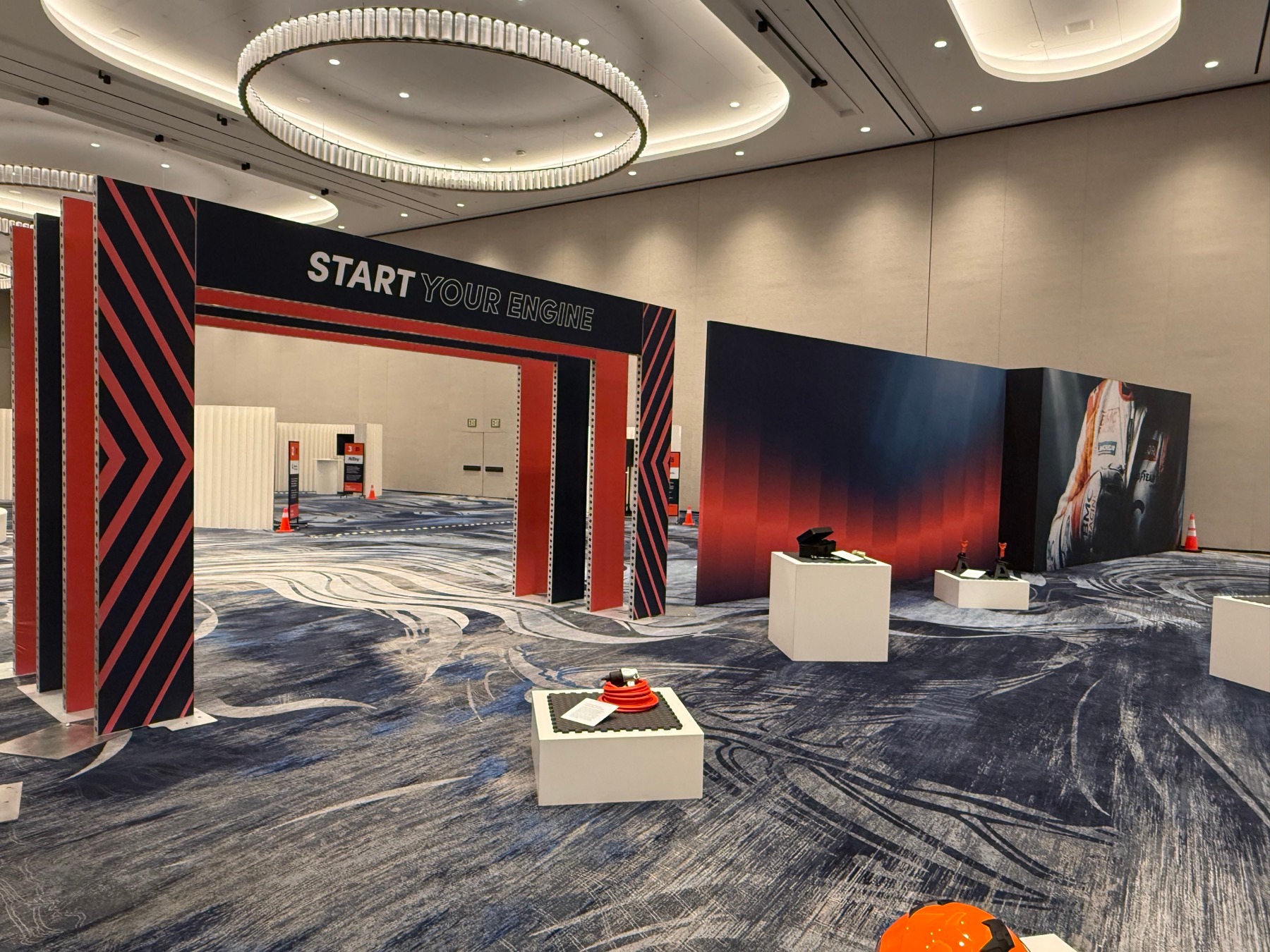 Wide custom graphic entrance and wall installation in an event hall